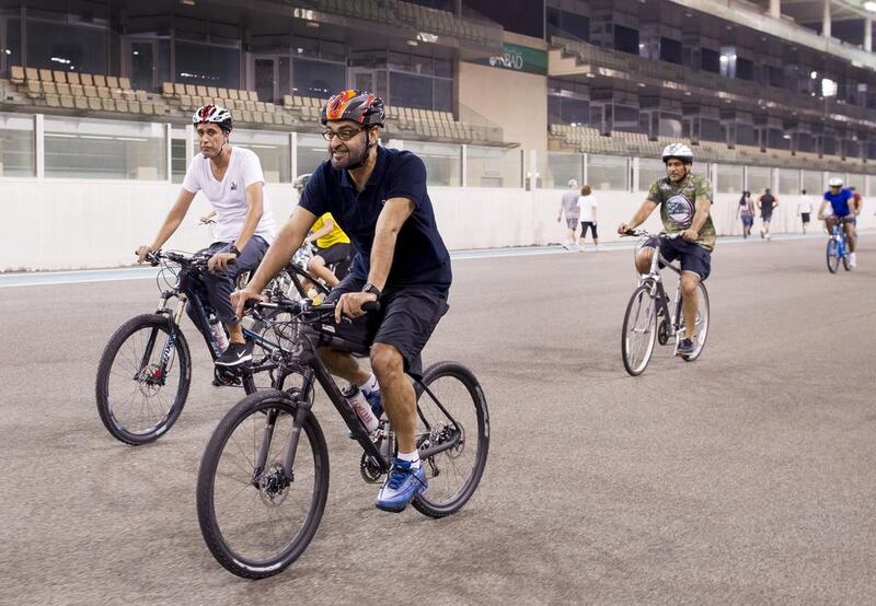 Sheikh Mohamed bin Zayed, Crown Prince of Abu Dhabi and Deputy Supreme Commander of the UAE Armed Forces, takes to his bicycle on the Yas Marina Circuit. Photo: Ryan Carter / Crown Prince Court 