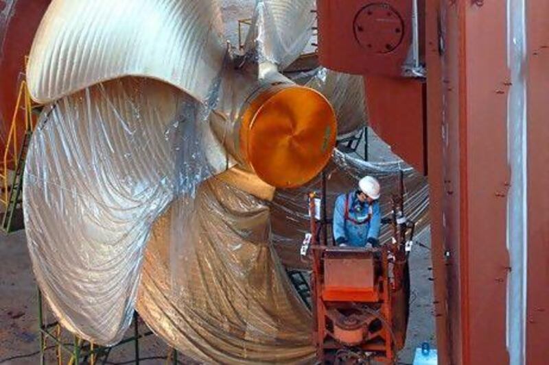 A ship under construction at a yard in Ulsan exemplifies South Korea's strategy for integrating the country into the world market. Seokyong Lee for The National