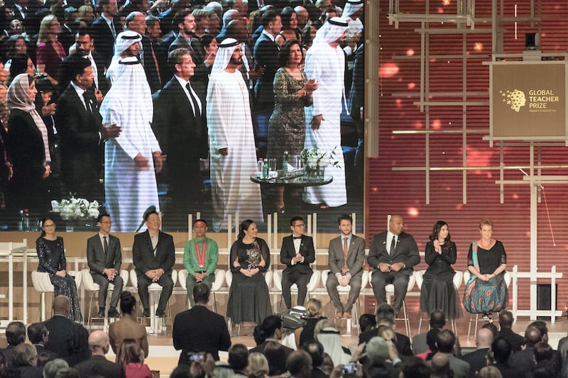 DUBAI, UNITED ARAB EMIRATES. 18 MARCH 2018. The Varkey Foundation's Global Teacher Prize at Atlantis. 2018 winner Andria Zafirakou. Sheikh Mohammed Bin Rashid Al Maktoum with the ten finalists. (Photo: Antonie Robertson/The National) Journalist: Roberta Pennington. Section: National.