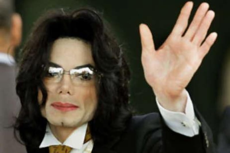 Michael Jackson waves as he arrives at the Santa Barbara County courthouse on June 3 2005, in Santa Maria, California.