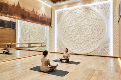 Practise yoga or meditation to build resilience. Photo: Raffles Dubai