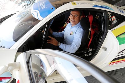 DUBAI , UNITED ARAB EMIRATES , DEC 06  – 2017:- Tani  Hanna , President of Ferrari Owners Club with his Ferrari car at the Dubai Autodrome in Dubai. (Pawan Singh / The National) Story by Adam Workman