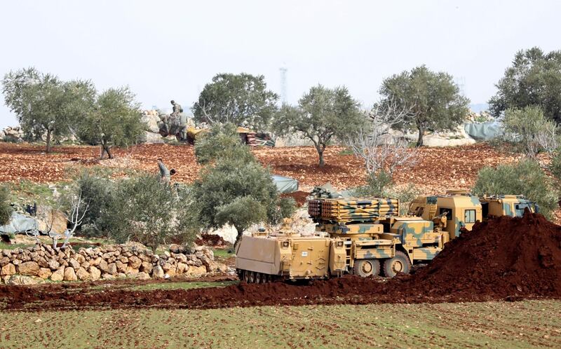 A view of Turkish soldiers and millitary armored vehicles at the Ad Dana district of north-east Idlib, Syria.  EPA