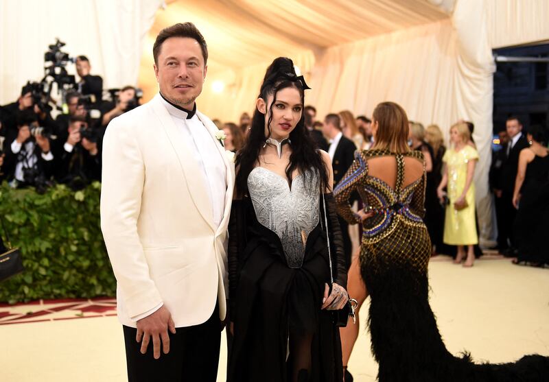 Mr Musk and then partner Grimes at The Metropolitan Museum of Art in New York City, in 2018 AFP