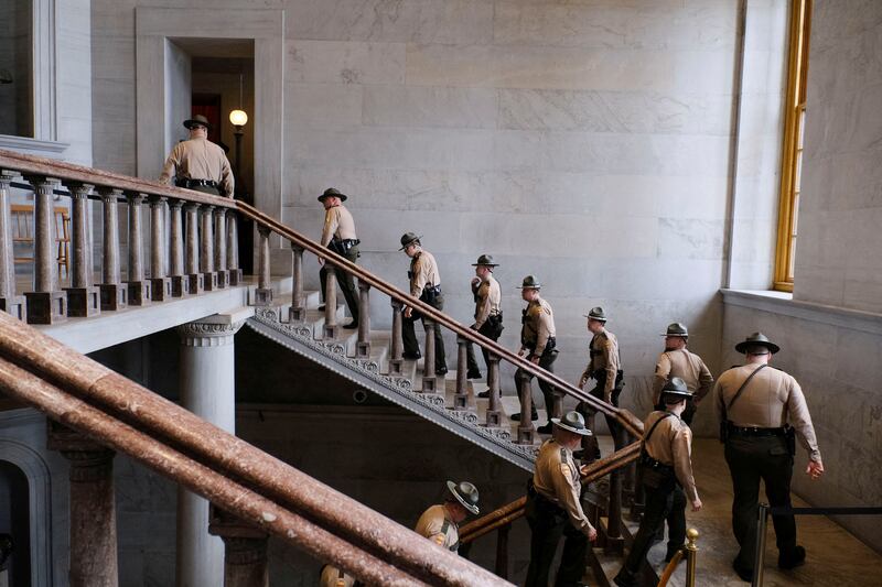 State troopers climb the steps of the Nashville capitol’s rotunda before the start of a legislative session, months after the Covenant School shooting and subsequent protests rocked Tennessee. Reuters