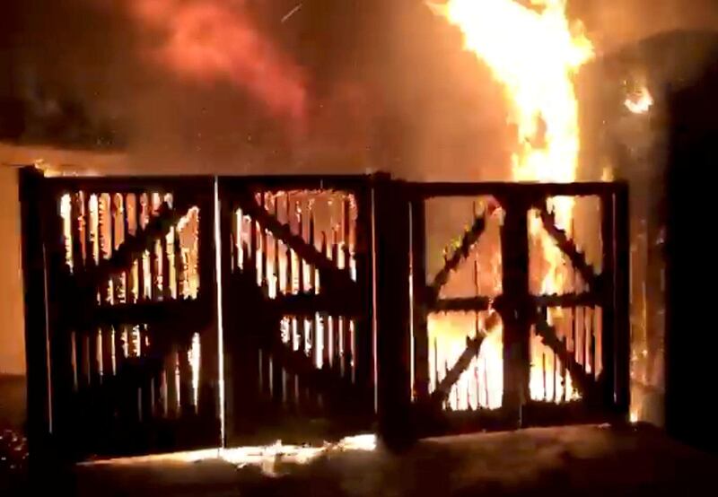 A cafe at London Zoo is seen on fire, in London in this image taken from video footage obtained from social media. Brendan Cooney/via Reuters.