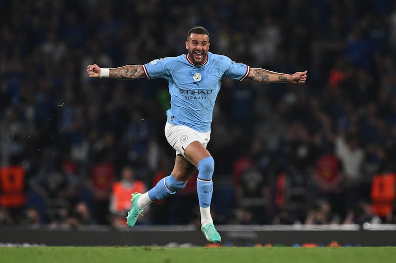 Manchester City's English defender #2 Kyle Walker celebrates winning the UEFA Champions League final football match between Inter Milan and Manchester City at the Ataturk Olympic Stadium in Istanbul. AFP