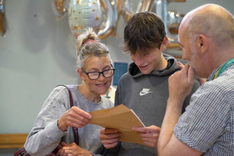 Is it true? A pupil at Fowey River Academy looks through his GCSE results.