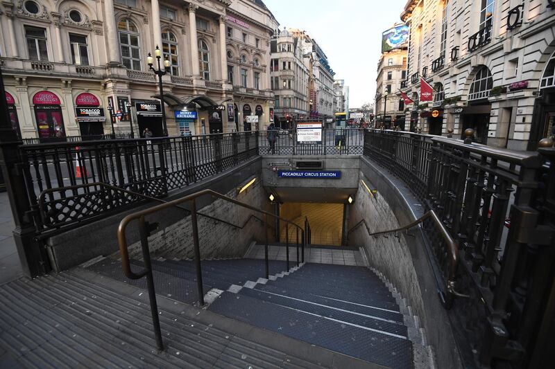 View of an empty underground staircase at Piccadilly Circus in London, Britain.  EPA