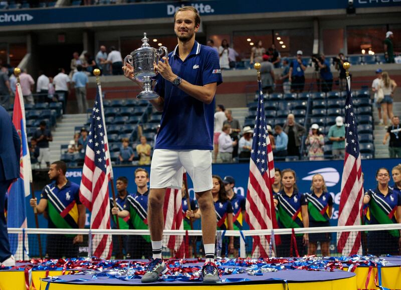 Russia's Daniil Medvedev celebrates with the trophy after winning the 2021 US Open. AFP