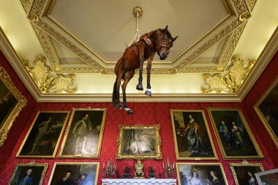 European Best Pictures Of The Day - September 12, 2019 - WOODSTOCK, ENGLAND - SEPTEMBER 12: (EDITORS NOTE: Retransmission of 1174135592 with alternate crop)  "Novecento", a taxidermy horse suspended from the ceiling, created by artist Maurizio Cattelan, is seen at Blenheim Palace on September 12, 2019 in Woodstock, England.  The Italian artist is known as the prankster of the art world.  His most notable piece being "America" a solid gold usable toilet which had art lovers queuing to use when it was shown at the Guggenheim Museum in New York. (Photo by Leon Neal/Getty Images)