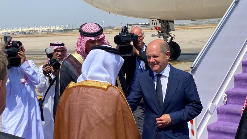 Prince Khalid bin Faisal, Governor of Makkah, receives German Chancellor Olaf Scholz on his arrival in Jeddah. Reuters