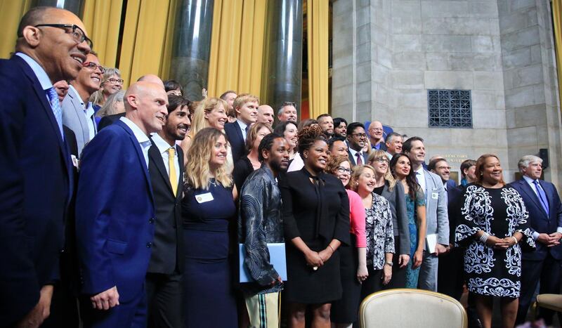 2018 Pulitzer Prize winners pose for pictures during the awards luncheon and ceremony at Columbia University on Wednesday May 30, 2018, in New York. AP