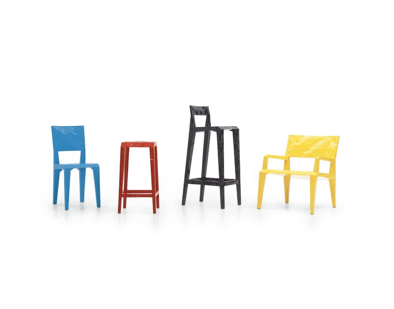 Collection composed by chair, high stool with and without backrest, low stool and armchair in thin metal plate injected with polyurethanic foam and polish lacquered in white, blue, yellow, grey, red and black colours. (Designer: Francois Azambourg)