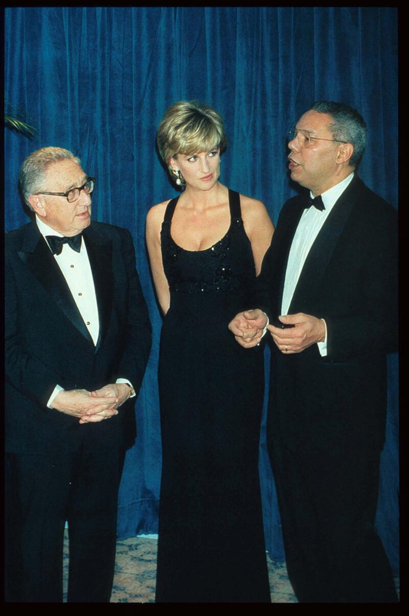 248217 01: Lady Diana Spencer stands with Henry Kissinger and General Colin Powell at the 41st annual United Cerebral Palsy Awards gala December 11, 1995 in New York City. Lady Diana, the Princess of Wales, received the UCP Humanitarian Award at the fundraising evening. (Photo by Pool/Liaison)