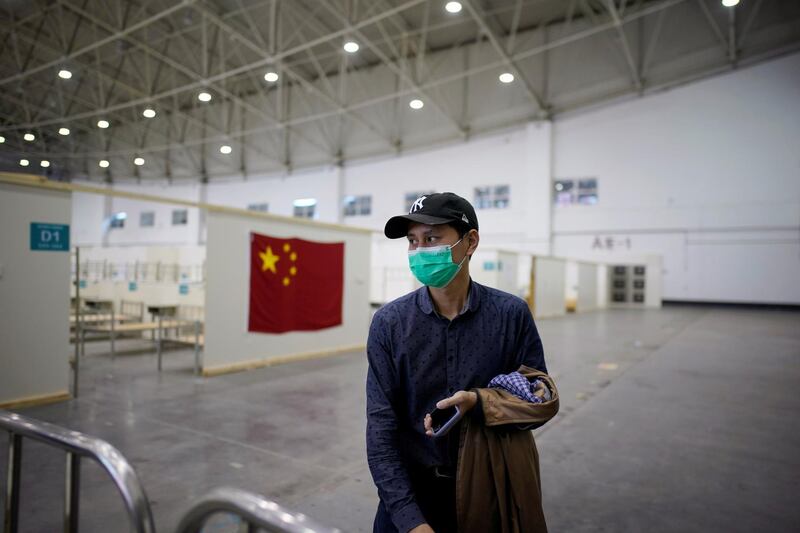 A staff member is seen inside a convention centre that was used as a makeshift hospital to treat patients  in Wuhan, Hubei province, China. Reuters