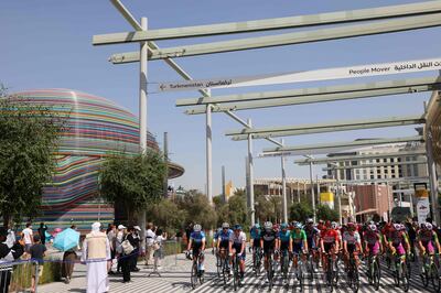 Riders cycle past the Russian pavilion at Expo 2020 during stage six of the UAE cycling tour in February that started and ended at the Expo 2020 Dubai. Photo: AFP