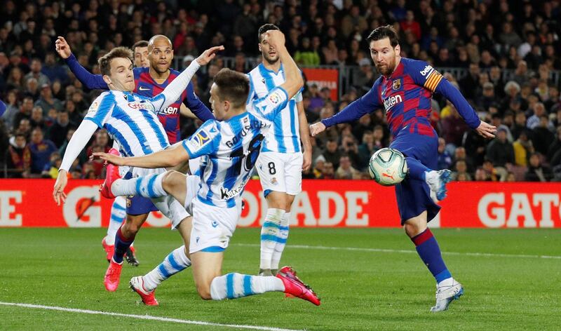 Barcelona's Lionel Messi shoots at goal against Real Sociedad. Reuters