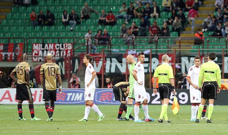 A decision to close the stands at San Siro for AC Milan versus Udinese this weekend has been overturned, pending further investigation. Antonio Calanni / AP Photo