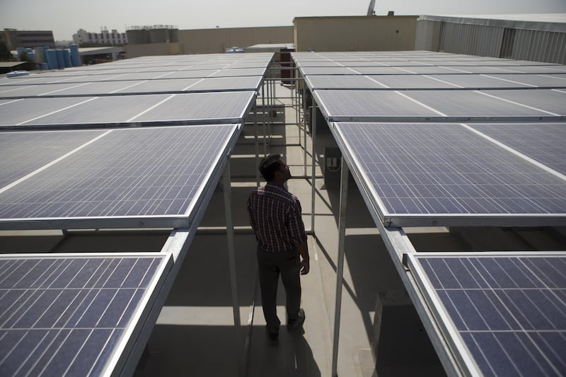 Rooftop solar panels on private homes and offices in Dubai. A think tank has found more moves to establish clean energy. Antonie Robertson / The National