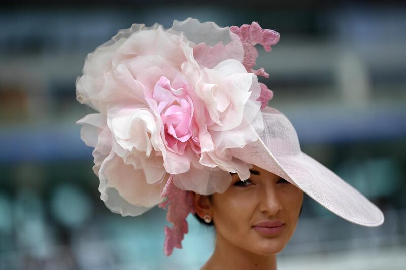 A wide brim with peonie style blooms is an elegant combination. EPA