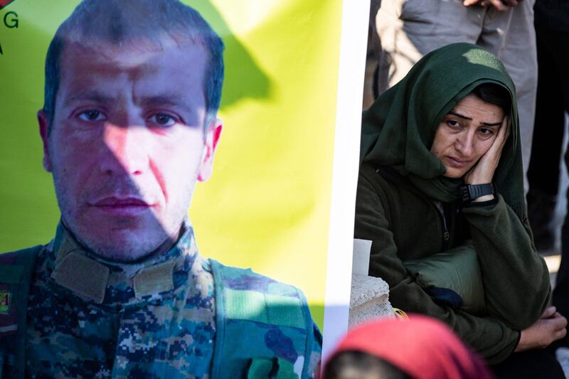 The funeral of a Kurdish People's Protection Unit (YPG)  fight in northern Syria on December 7. AFP