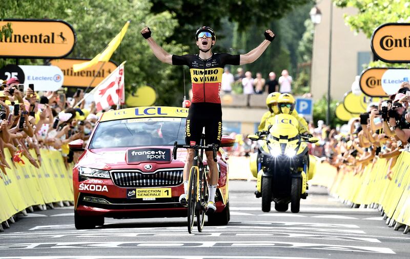 Team Jumbo Visma's Wout van Aert celebrates winning Stage 11 of the Tour de France on Wednesday, July 7.