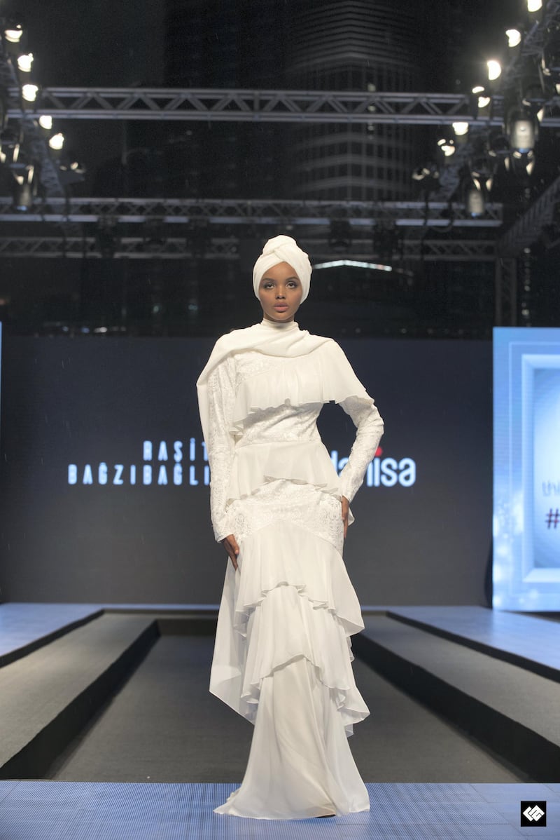 Halima Aden in Rasit Bagzibagli: one of the most prominent hijab-wearing models in the world, Aden sports a layered creation by the Turkish Cypriot bridal and eveningwear designer.