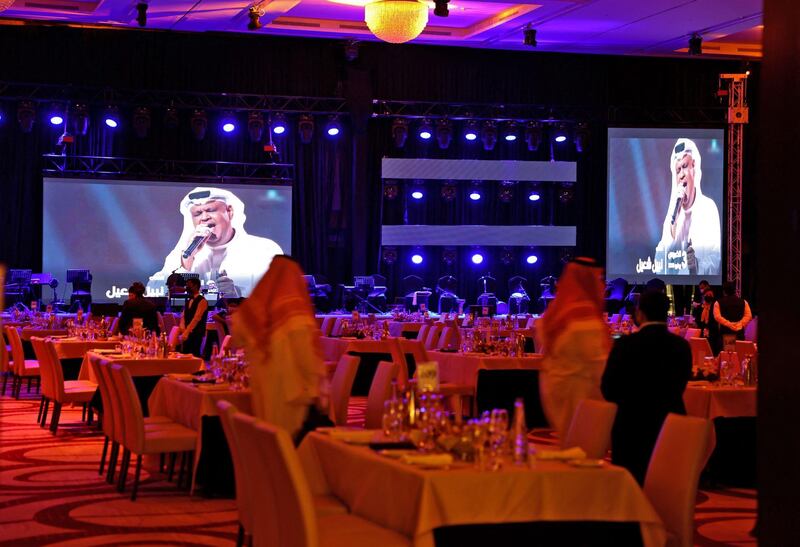 A picture taken late on June 3, 2021 show a theatre hosting the first concert in the Saudi capital Riyadh since the start of the COVID-19 pandemic. Riyadh is accelerating a nationwide vaccination drive as it moves to revive tourism and host sports and entertainment extravaganzas, all pandemic-hit sectors that are a bedrock of the "Vision 2030" program to diversify the oil-reliant economy. / AFP / Fayez Nureldine
