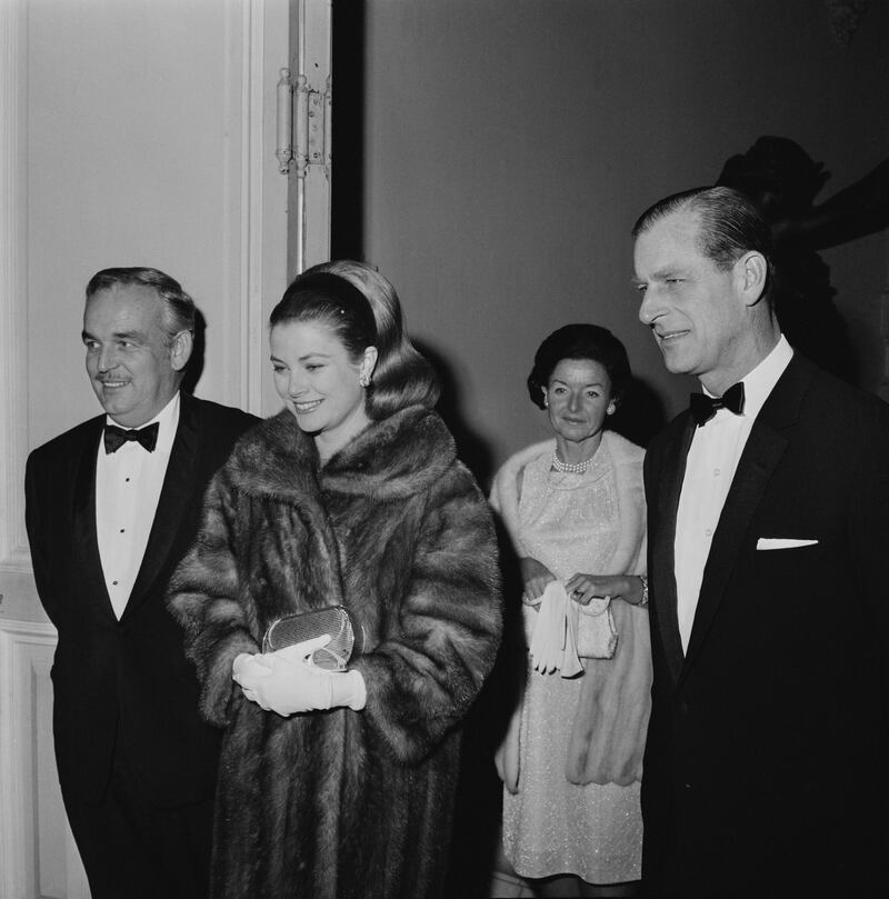 Rainier III, Prince of Monaco (1923 - 2005) with his wife, American actress Grace Kelly (1929 - 1982), and Prince Philip at the OpÃ©ra de Monte-Carlo, Monaco, 15th December 1966. (Photo by Reg Lancaster/Daily Express/Hulton Archive/Getty Images)