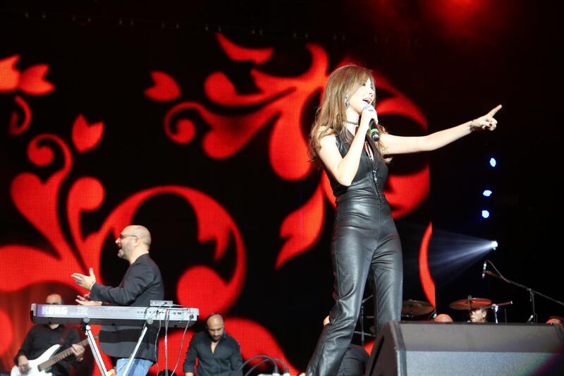Abu Dhabi, UAE - November 26, 2016 -  Nancy Ajram delights with her hits on Day 3 at Beats on the Beach - Navin Khianey for The National *** Local Caption ***  NK2611_BeatsOnTheBeach_Day3_NancyAjram_12.JPG