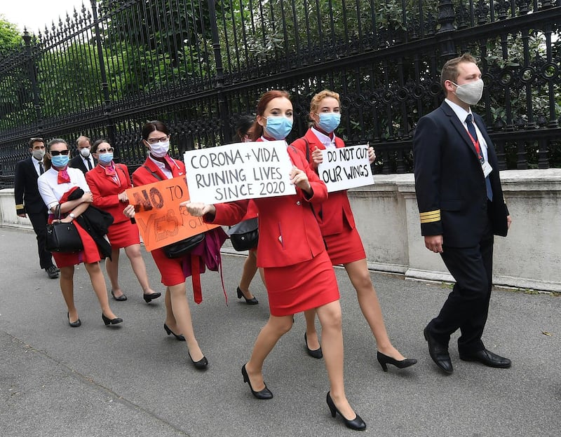 Employees of the Laudamotion airline demonstrate after negotiations failed between the Vida trade union and Laudamotion owner Ryanair, in Vienna. The Vida trade union representing workers in the transport and service industries in Austria had refused to accept pay cuts for employees of the Laudamotion carrier hard hit by the coronavirus crisis. AFP