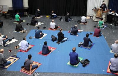 Muslims pray inside the evangelical church of St. Martha's parish, during their Friday prayers, as the community mosque can't fit everybody in due to social distancing rules, amid the coronavirus disease (COVID-19) outbreak in Berlin, Germany, May 22, 2020.   REUTERS/Fabrizio Bensch