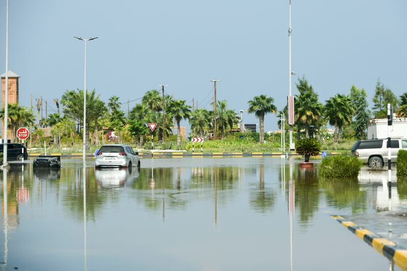 Vehicles trapped by the floods in Fujairah. Khushnum Bhandari / The National
