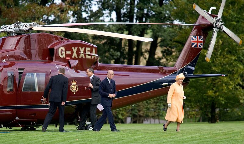 Queen Elizabeth and Prince Philip arrive to officially open the new headquarters of the Royal Bank of Scotland in Gogarburn, in 2005.