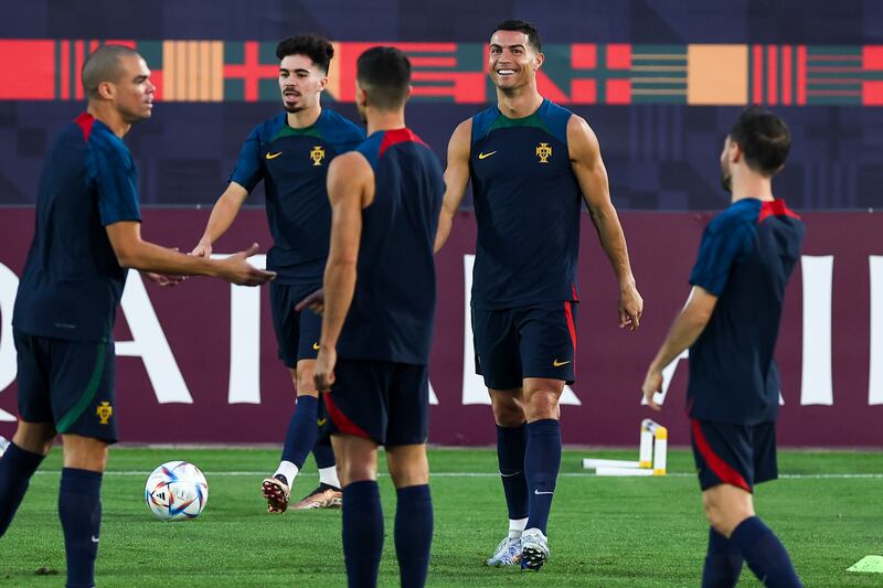 Portugal players Pepe, Vitinha, Andre Silva, Cristiano Ronaldo and Bernardo Silva during a training session in Al-Shahaniya on the eve of their World Cup quarter-final against Morocco. EPA