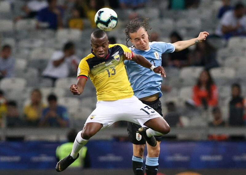 Soccer Football - Copa America Brazil 2019 - Group C - Uruguay v Ecuador - Mineirao Stadium, Belo Horizonte, Brazil -  Ecuador's Enner Valencia in action with Uruguay's Diego Laxalt.  Reuters
