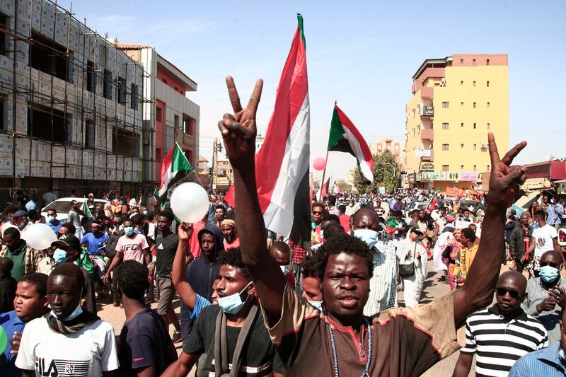 Protesters fill a road in northern Khartoum. The rallies are a continuation of protests against October's military takeover in the country. AFP