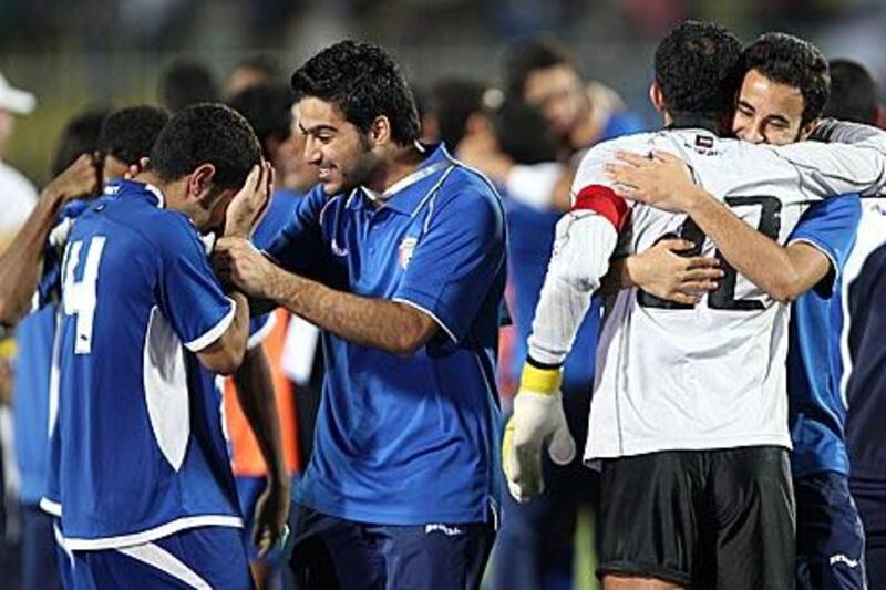 Kuwaiti players celebrate after beating Iraq in the southern Yemeni city of Aden.