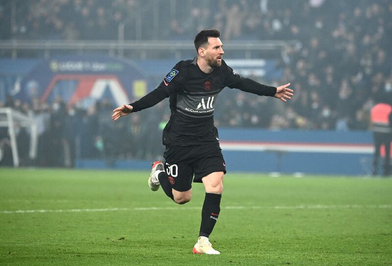 Paris Saint-Germain's Argentinian forward Lionel Messi celebrates after scoring. AFP