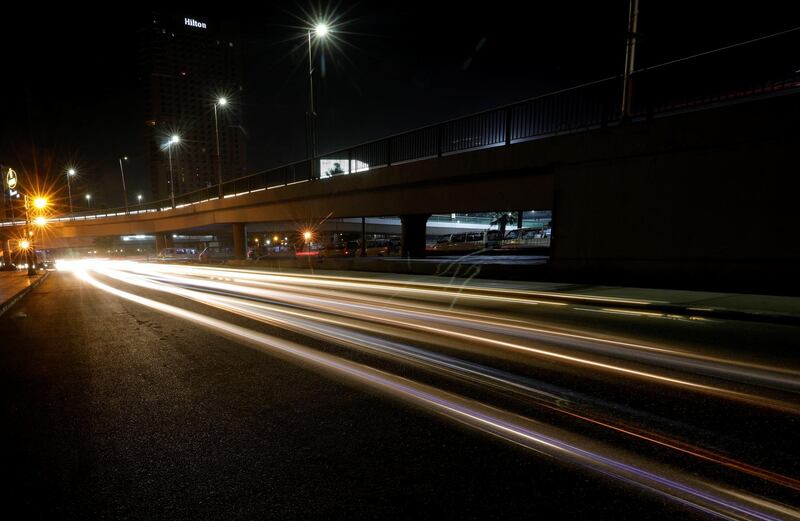 A view of the the city and traffic during a night-time curfew in Cairo, Egypt. Reuters