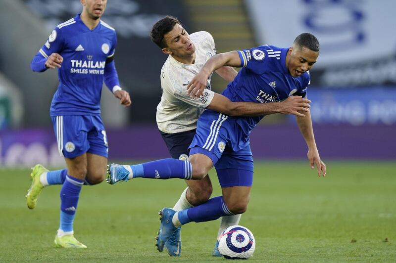 Manchester City's Rodrigo and Youri Tielemans of Leicester City battle for possession. Getty Images