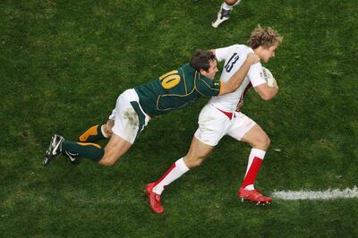 England's centre Mathew Tait is tackled by South Africa's fly-half Butch James during the rugby union World Cup final match England vs South Africa, 20 October 2007 at the Stade de France. Getty

