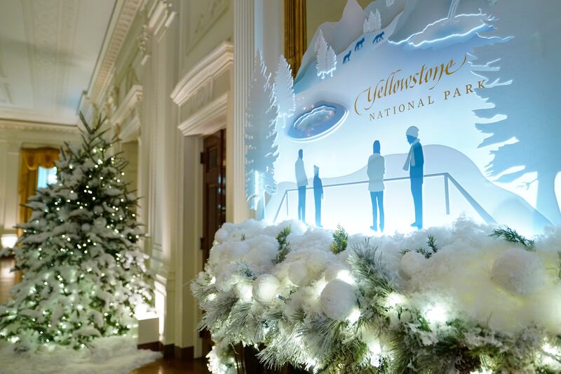 The decorations include more than 83,000 twinkling lights on trees, garlands, wreaths and other displays. AP