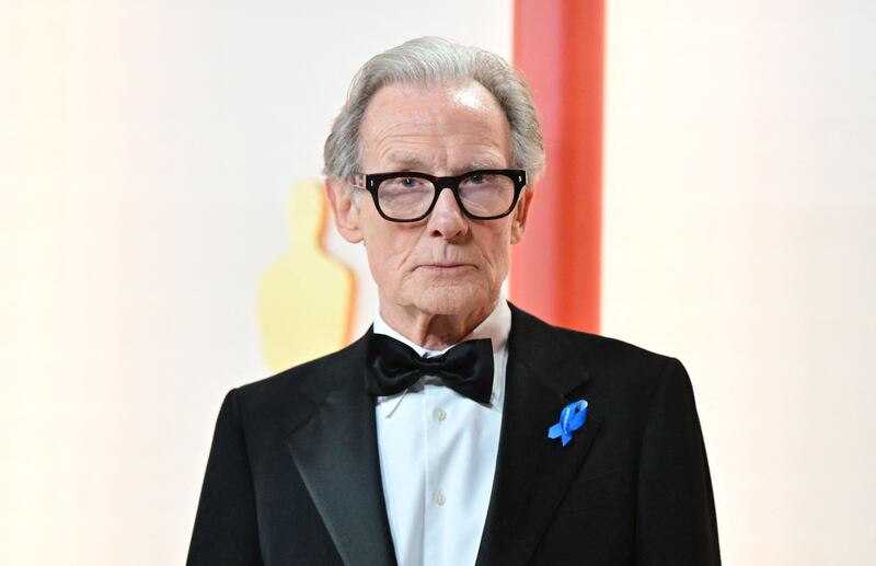 British actor Bill Nighy with his #WithRefugees ribbon. AFP