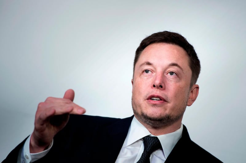 (FILES) In this file photo taken on July 19, 2017, Elon Musk, CEO of SpaceX and Tesla, speaks during the International Space Station Research and Development Conference at the Omni Shoreham Hotel in Washington, DC. - "Boring bonehead questions are not cool. Next?" Tesla chief Elon Musk complained in May, shortly before shutting down questions from Wall Street. The now-infamous conference call in a nutshell represents the unorthodox approach of Musk, whose brazen aspirations to remake the transportation universe and confrontational approach to opponents has aroused both passionate support and furious criticism. (Photo by Brendan Smialowski / AFP)