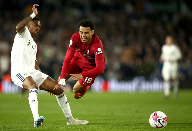 Junior Firpo of Leeds in action against Cody Gakpo of Liverpool. EPA