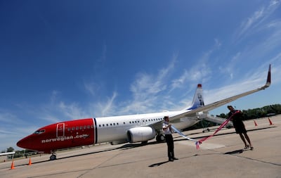 FILE PHOTO: A Norwegian Air Boeing 737-800 is seen during the presentation of Norwegian Air first low cost transatlantic flight service from Argentina at Ezeiza airport in Buenos Aires, Argentina, March 8, 2018. REUTERS/Marcos Brindicci/File Photo/File Photo
