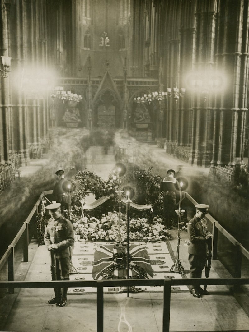 Mourners file past the tomb of the Unknown Warrior at Westminster Abbey, London, 1920 