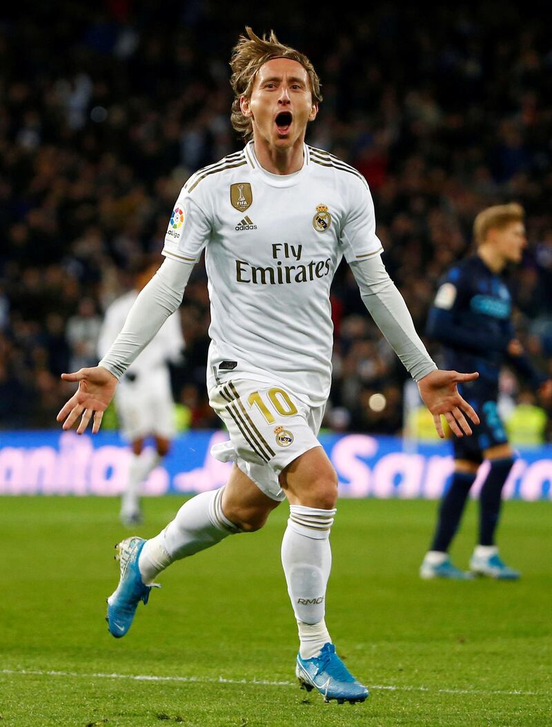 Luka Modric celebrates scoring Real's third from a Gareth Bale cross. Reuters
